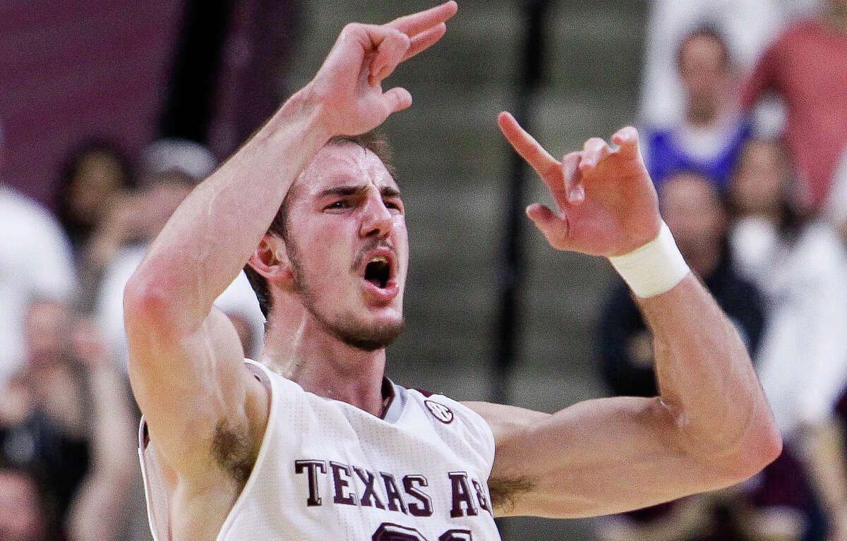 Texas A&M Aggies guard Alex Caruso pumps up the crowd as LSU takes a timeout on Jan. 19, 2016, in College Station.