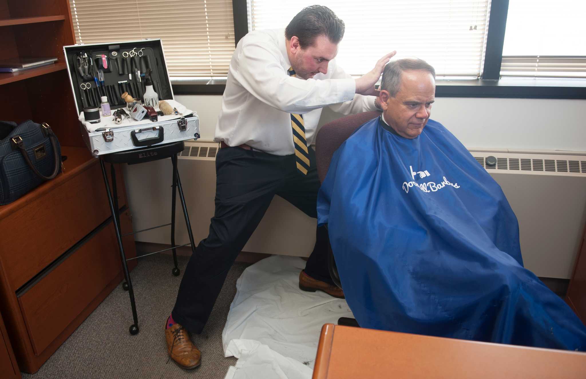 Stamford entrepreneur brings the barbershop to your home or office