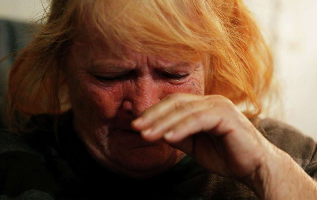 Dorothy Patton Barrera cries while explaining why she is fighting to have the cremated remains of her husband, Pedro, buried at the San Domingo Cemetery in Normanna, Texas on Friday, Mar. 4, 2016. However, Barrera wishes were refused by Jimmy Bradford who is the apparent caretaker for the cemetery. Barrera was initially told that Hispanics nor black persons were allowed to be buried there. Barrera railed against the idea of not being allowed to do so and has hired attorney Sid Arizmendez of Beeville to help rectify the situation. Late Friday, Barrera was informed that Bradford reconsidered his position and has allowed her to bury her husband at the cemetery. Barrera, however, is still considering or legal action so that future issues regarding race will not take place at the cemetery.