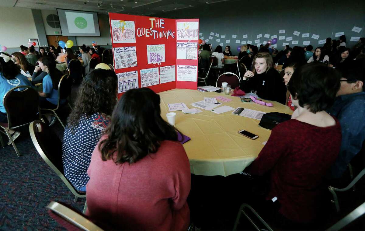 A group at a table discusses the topic of gender identity as over 200 young women from area middle and high schools take part in the Women's Global Connection's Girls Global Summit at University of the Incarnate Word on Saturday, Mar. 5, 2016. Participants listened to motivational lectures and took part in interactive discussions which encouraged empathy on issues facing women around the world. (Kin Man Hui/San Antonio Express-News)