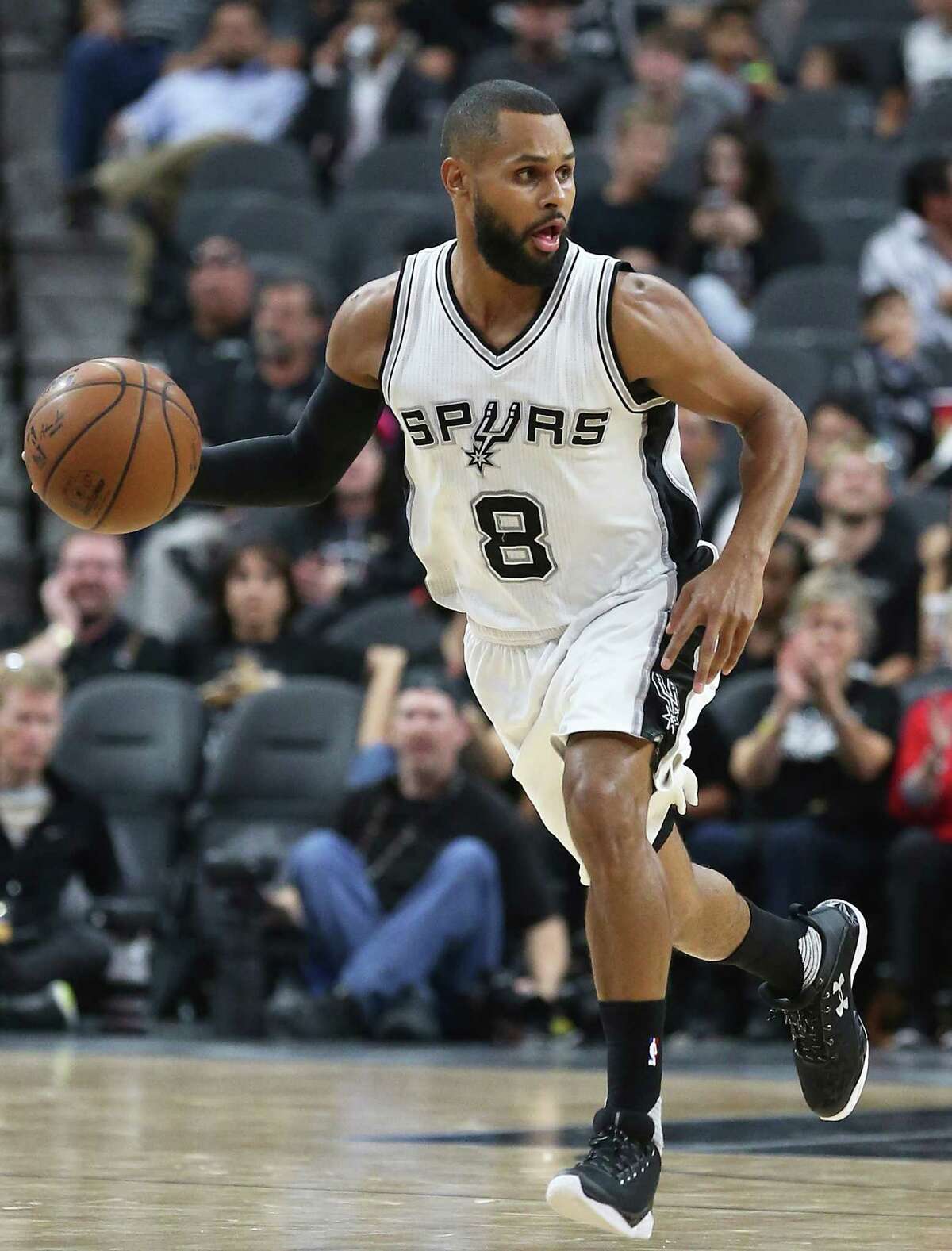 Patty Mills brings the ball up court as the Spurs host the Pistons at the AT&T Center on March 2, 2016.