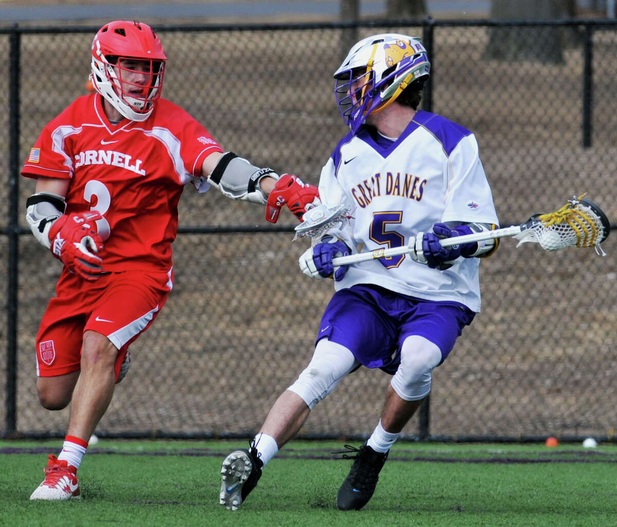 Connor Fields looks at his last line of Cornell University's defense before shooting and scoring the seventh goal of the Saturday, March 5, 2016, game on John Fallon's Field in University at Albany, Albany, N.Y. (Brittany Gregory / Special to the Times Union)