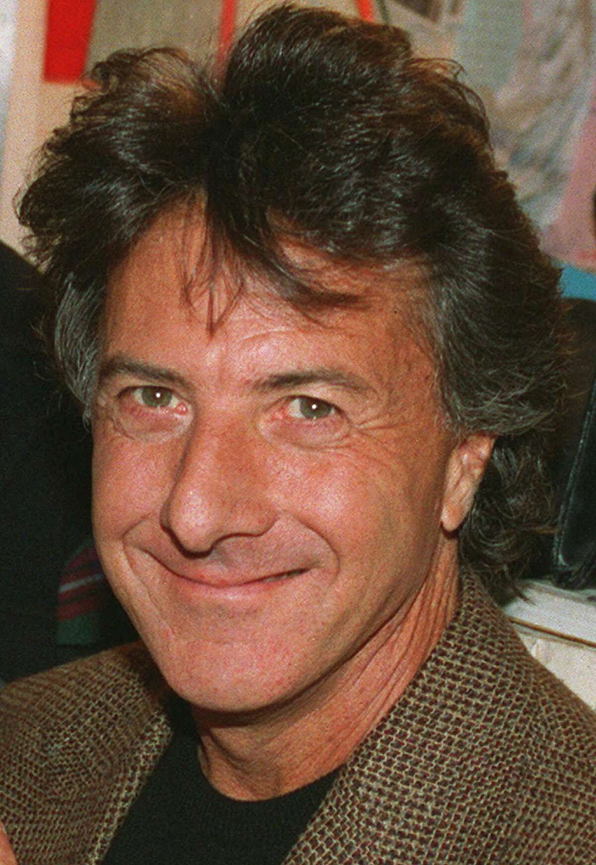 FILE--Actor Dustin Hoffman, shown in a September 1993 file photo, can go ahead with a lawsuit against Los Angeles Magazine. A federal judge said the magazine's computer-altered photograph of Hoffman in a yellow dress isn t protected by the Constitution. Hoffman sued for $5 million in April 1997 claiming the photograph was altered with a computer and used without his permission. (AP Photo/Osamu Honda)