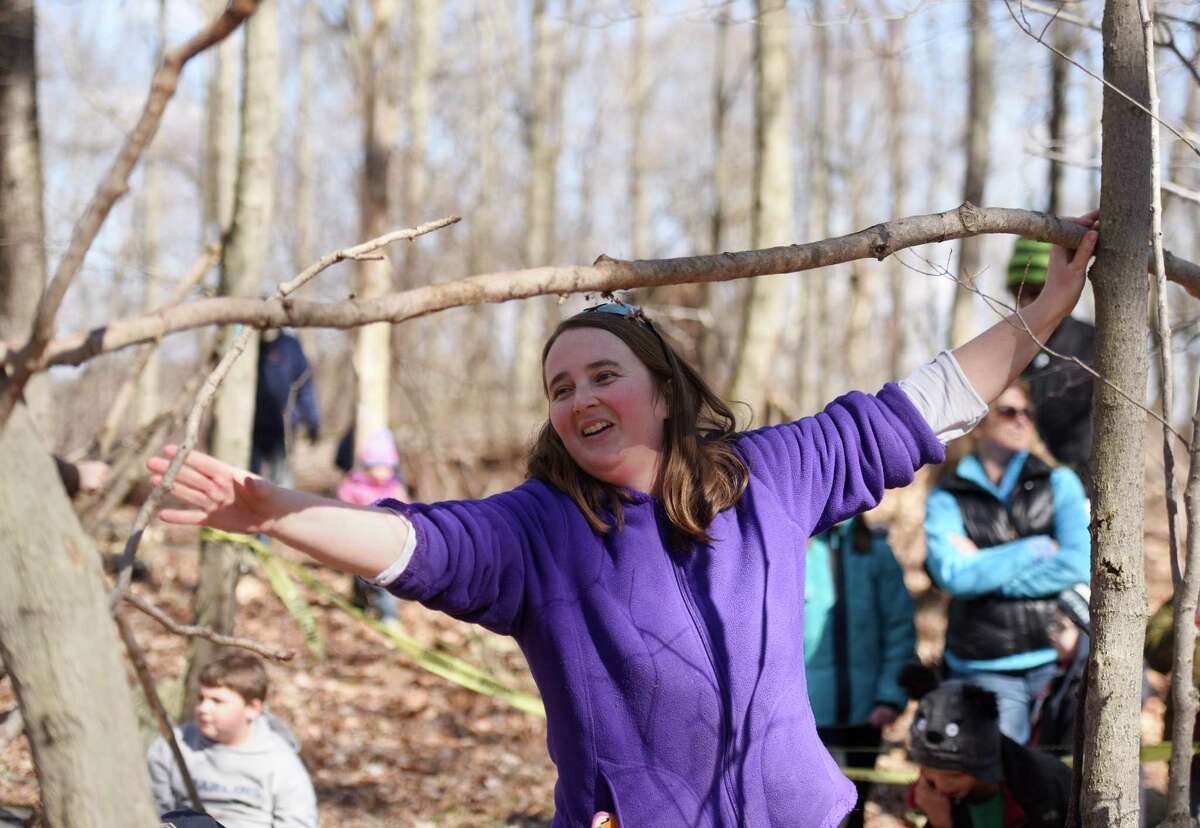 Education Coordinator Susan Matthews demonstrates how to build a survival shelter during the Family Nature Play Series at Audubon Greenwich in Greenwich, Conn. Sunday, March 6, 2016. Families learned how to collect sticks to build a campfire and build a survival lean-to shelter. The Family Nature Play Series occurs on the first Sunday of every month and provides hands-on, educational activities for children and parents. The next two sessions will be wildlife tracking and a sensory nature hike.