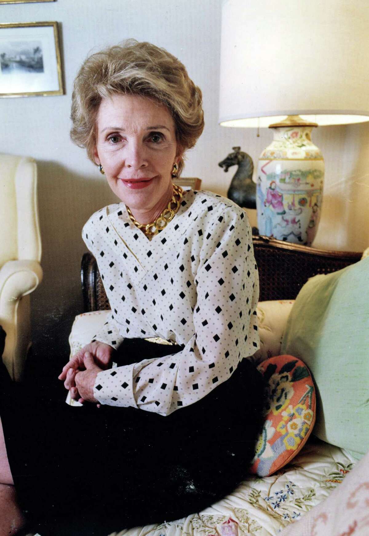 Former first lady Nancy Reagan, shown in 1989 at her office in Los Angeles, died of heart failure on Sunday at age 94 in Los Angeles.