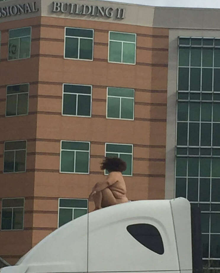 Naked Dancing Woman On Top Of Big Rig Ties Up 290 Traffic