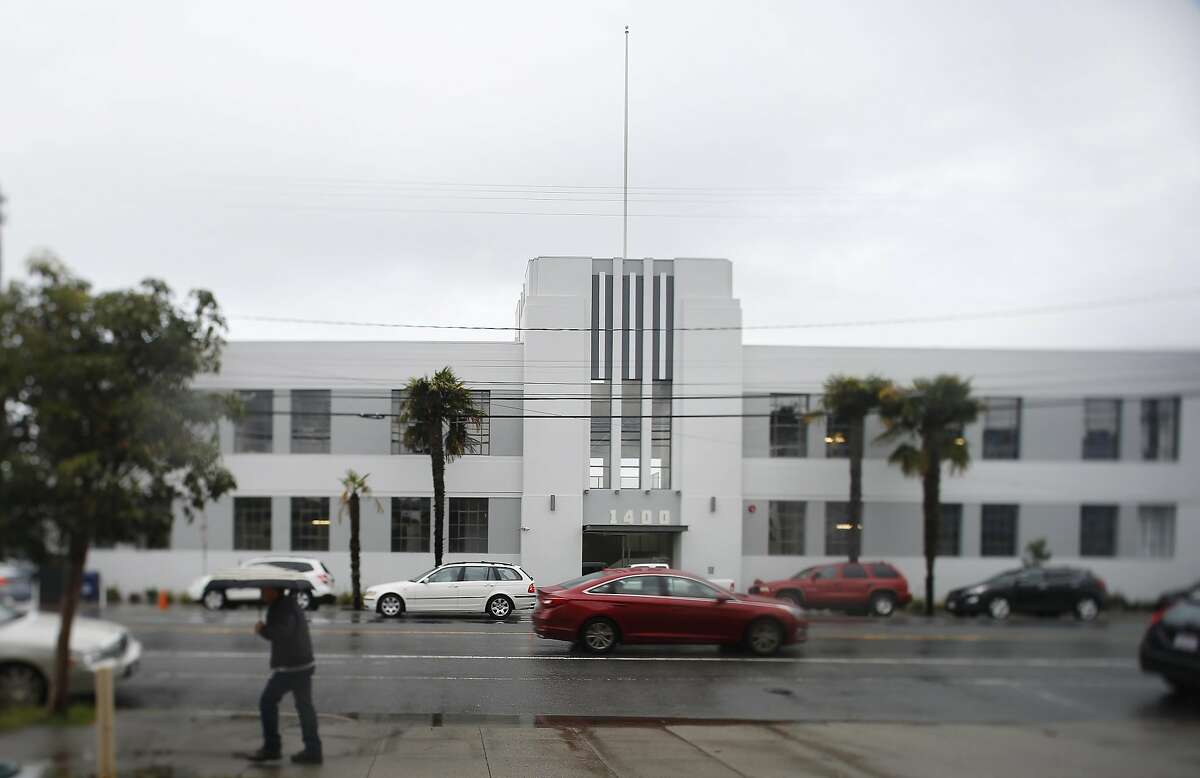 A pedestrian walks past the McClintock Building at 1400 16th Street on Monday, March 7, 2016 in San Francisco, California.