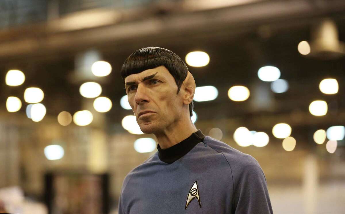 Paul Forest, also known as "Spock Vega," watches fans at the Space City Comic Con last July. The event returns to NRG Center this Memorial Day weekend. ﻿
