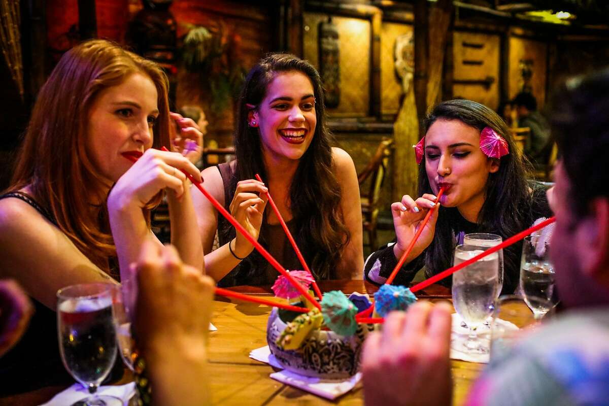 (l-r) Cristine Jessen, Casey Nuckols and Cecilia Shaw sip cocktails as they celebrate Cecilia's birthday at the Tonga Room on Friday, March 4, 2016 in San Francisco, California.