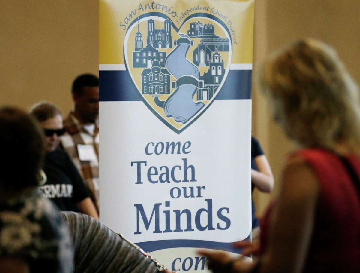 The San Antonio Independent School District holds a teacher job fair at the Convention Center last summer. A reader defends a recent pay increase for permanent full-time workers in the district.
