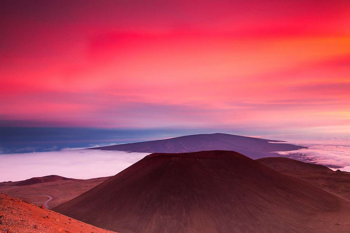 Snow blankets Mauna Kea and Mauna Loa on the Big Island of Hawaii