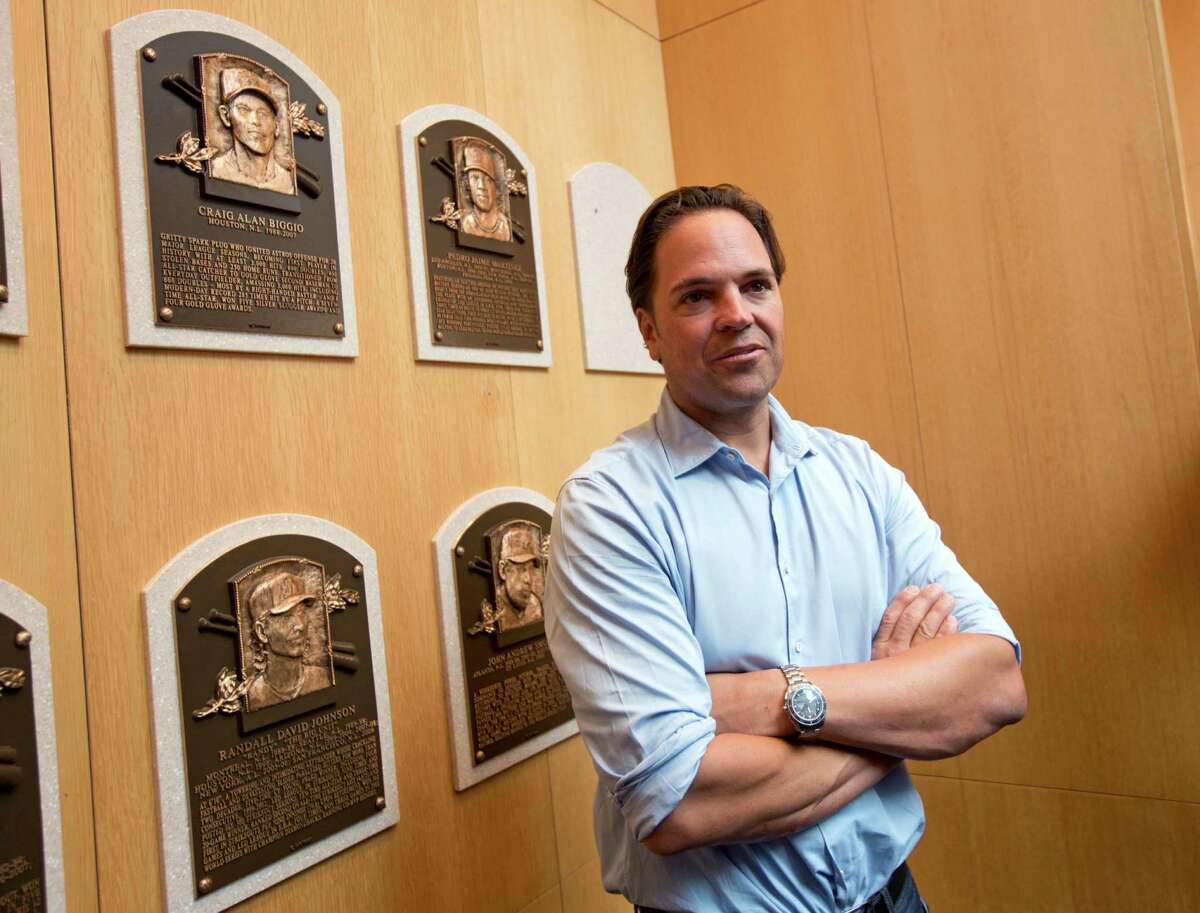 Baseball Hall of Fame electee Mike Piazza stands where his plaque will hang during his orientation tour at the hall on Tuesday, March 8, 2016, in Cooperstown, N.Y. Piazza will be inducted in July. (AP Photo/Mike Groll) ORG XMIT: NYMG111