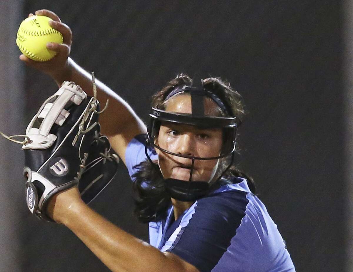 Johnson pitcher Caitlyn Colquhoun throws to first for the final out in a 7-1 win over Reagan 7-1 at the NESD Softball Complex on March 8, 2016.