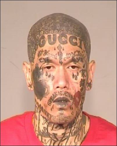 Gucci' face tattoo Fresno felon's mugshot