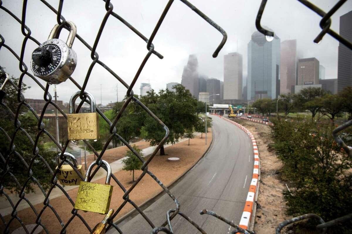 Traffic flows past construction underway along Allen Parkway on Monday, Feb. 22, 2016, in Houston. The lane on the left is slated to be parking for Eleanor Tinsley Park, once the project is completed. The center lane will be for westbound traffic.