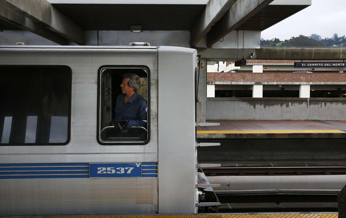 A train conductor looks out his window before pulling out of the El Cerrito del Norte BART station March 9, 2016 in El Cerrito, Calif.