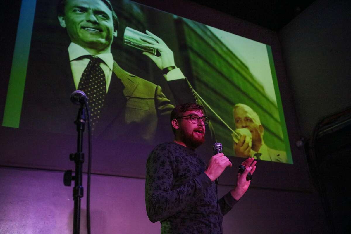 Presenter Bairan Jacobsohn, of Zynga, is tasked with improvising a presentation on a subject without knowing what slides will be coming next, as he performs on stage at a show called Speechless, at Public Works in San Francisco, California, on Wednesday, March 9, 2016.