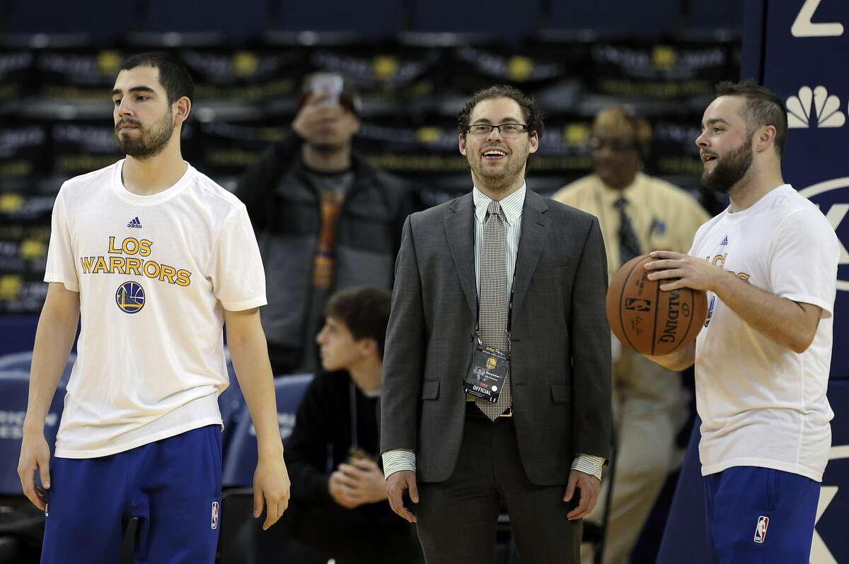 Warriors Coordinator of Basketball Analytics, Sammy Gelfand, center, chats with staffers, (tk) during warmups before the Golden State Warriors played the Utah Jazz at Oracle Arena in Oakland, Calif., on Wednesday, March 9, 2016.