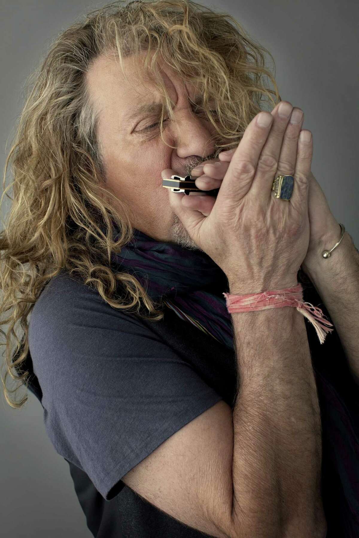 Robert Plant: The harmonica has once again gotten tangled in his hair.