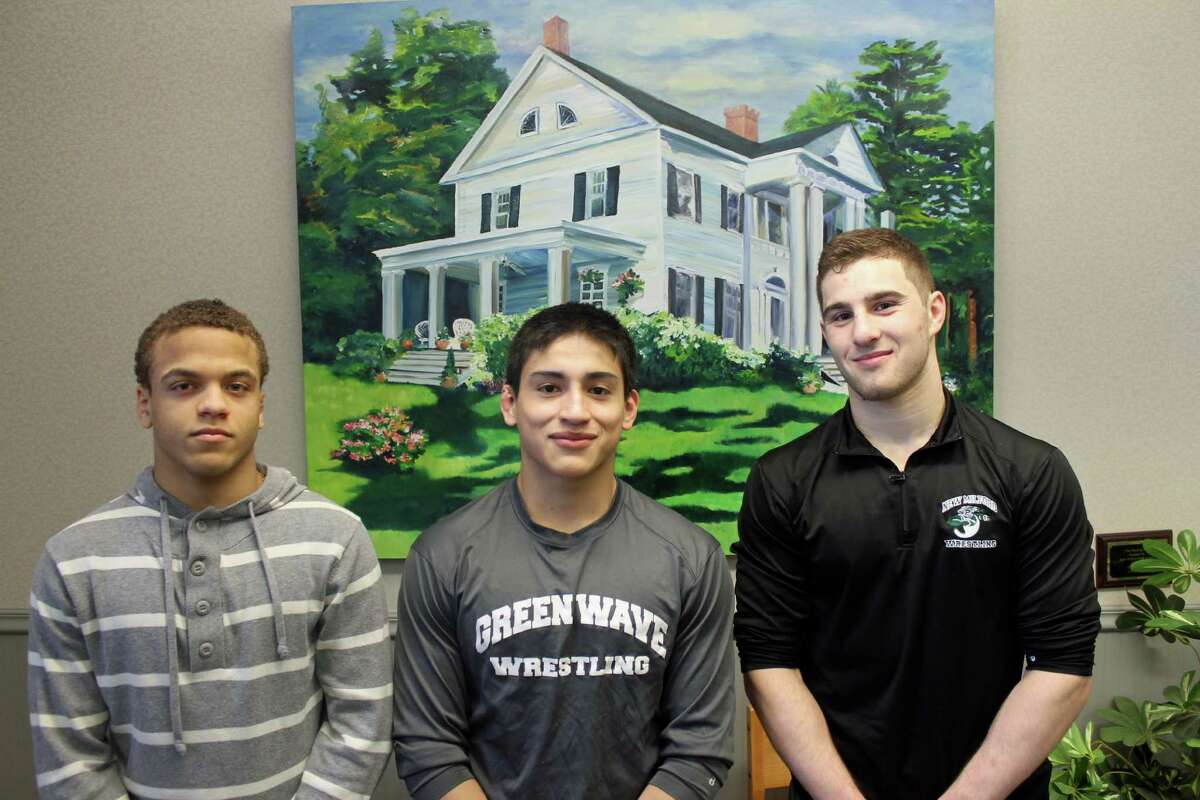 From left, sophomore Mel Ortiz, senior Bryan Rojas and senior Brett Leonard are heading to Nationals after medaling for New Milford High School last week at the New England Wrestling Championships. Leonard captured the New England title at 160 pounds, while Ortiz (120) and Rojas (145) each placed fifth. All three wrestlers won their weight classes at the Class L state championships to help lead the Green Wave to the team title.