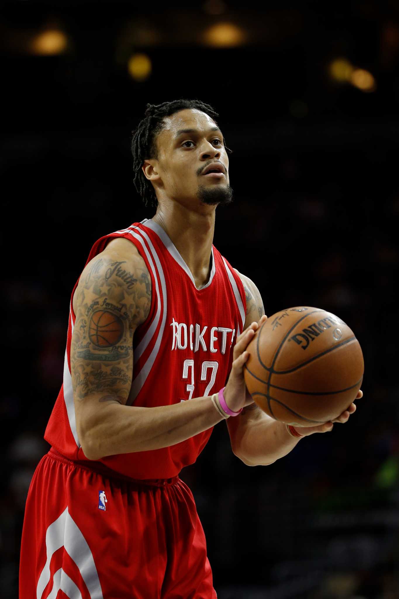 Improving K.J. McDaniels nets praise from Rockets coach