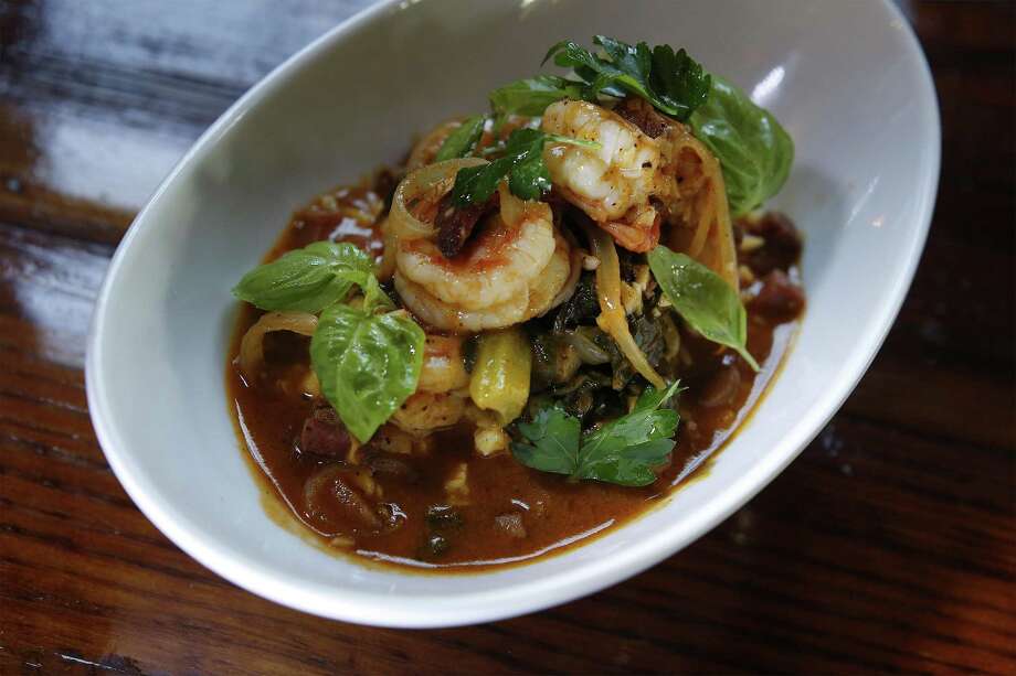 kiss my grits includes shrimp, tasso ham, shrimp butter broth