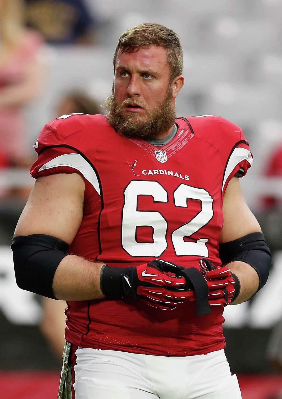 Guard Ted Larsen of the Arizona Cardinals warms up before the NFL game against the St. Louis Rams at the University of Phoenix Stadium on November 9, 2014 in Glendale, Arizona.