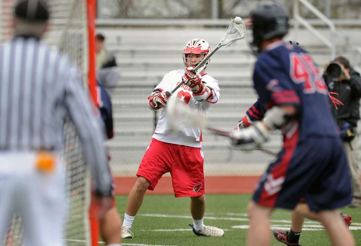 Woody Waesche, # 3 of Greenwich High School, takes a shot on goal during lst quarter action of game against New Fairfield High School, at GHS, April 9, 2010. No goal was scored on the shot.