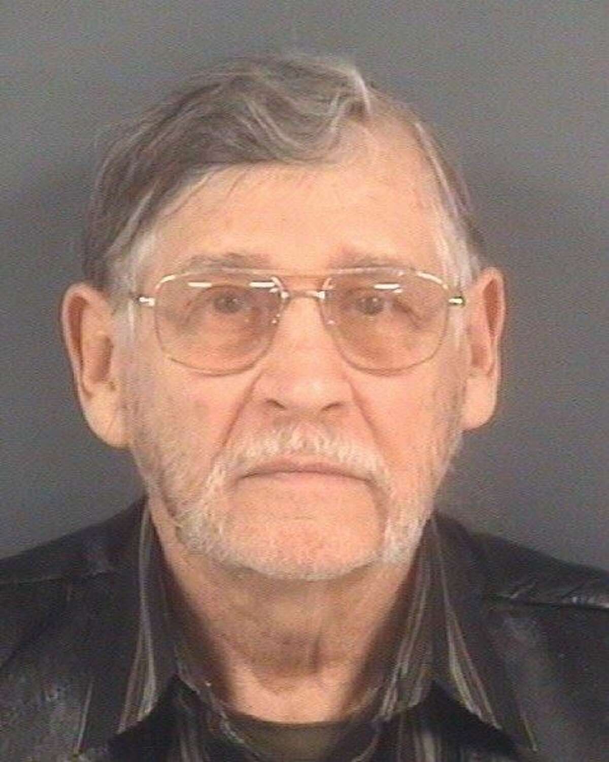 John Franklin McGraw, 78, has been charged with assault and battery and disorderly conduct after allegedly sucker-punching a protester at a Donald Trump rally on March 9, 2016, in Fayetteville, North Carolina.