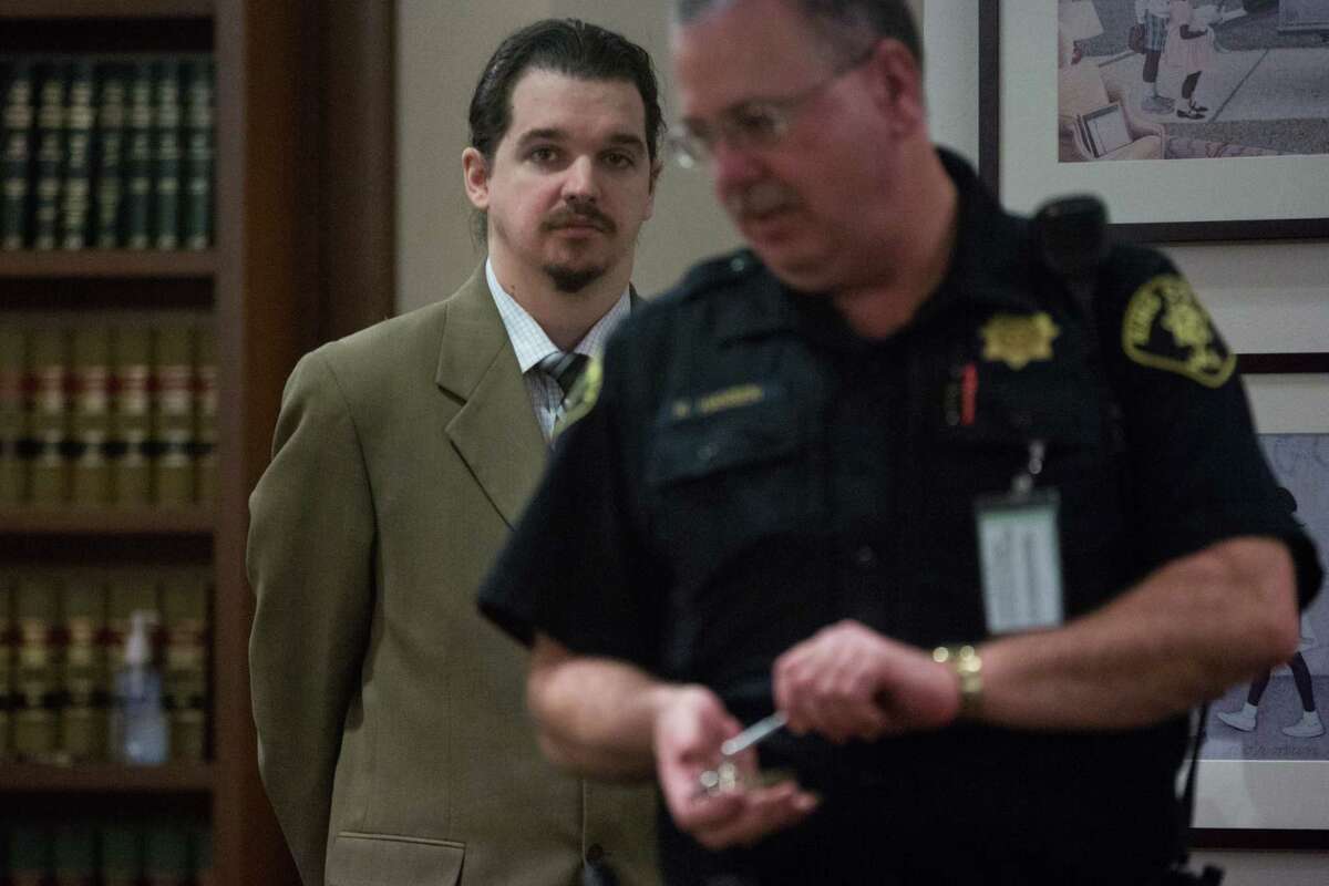 Christopher Sefton enters King County Superior Court Judge James Cayce's courtroom in Kent on Wednesday, Mar. 9, 2016.