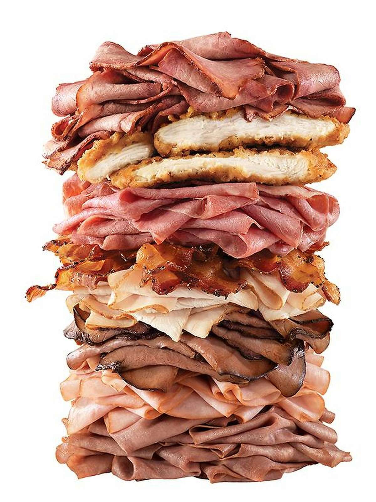Arby’s Meat Mountain File this monstrosity under “The customer isn’t always right.” Arby’s posted a giant stack of various meats in a promotional photo to show that it didn’t only serve roast beef. However, customers took the photo as a literal ad for a sandwich. Thus, like an accidental Frankenstein’s monster, the Meat Mountain was added to Arby’s secret menu.  What is a Meat Mountain, exactly? All this lies within the bun: two chicken tenders, ham, roast turkey, brisket, corned beef, angus steak, Swiss cheese, cheddar cheese, and of course, bacon. The defibrillator will be extra.