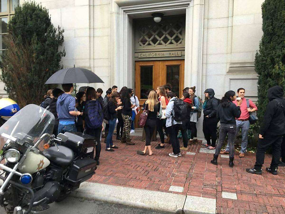 Students from UC Berkeley School of Law deliver a letter of complaint to Chancellor Nicholas Dirks about his handling of accusations of sex harassment against the law school's dean.