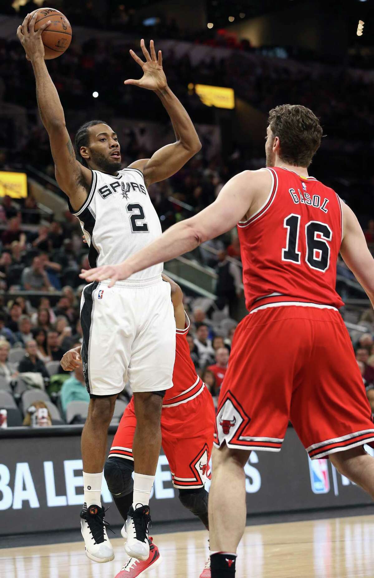 Kawhi Leonard goes up looking to pass as the Spurs host Chicago at the AT&T Center on March 10, 2016.