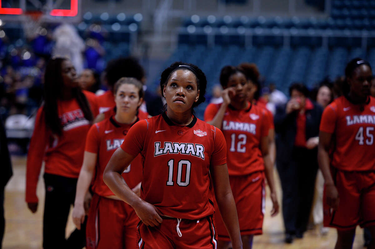 Lamar's women's basketball team walks off the court after losing to McNeese State in the Southland Conference tournament on Friday morning. The Cardinals lost 88-78, ending their season. Photo taken Friday 3/11/16 Ryan Pelham/The Enterprise