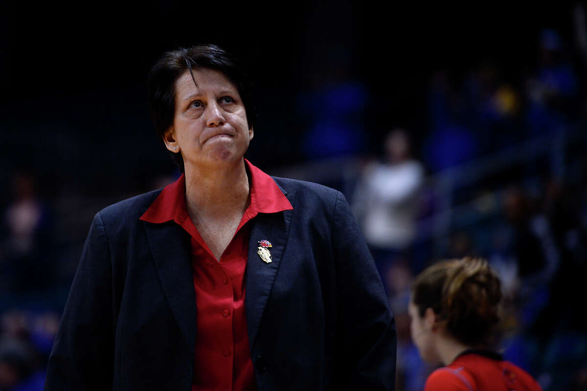Lamar women's basketball head coach Robin Harmony looks at the scoreboard in the final seconds of the game against McNeese State in the Southland Conference tournament on Friday morning. The Cardinals lost 88-78, ending their season. Photo taken Friday 3/11/16 Ryan Pelham/The Enterprise