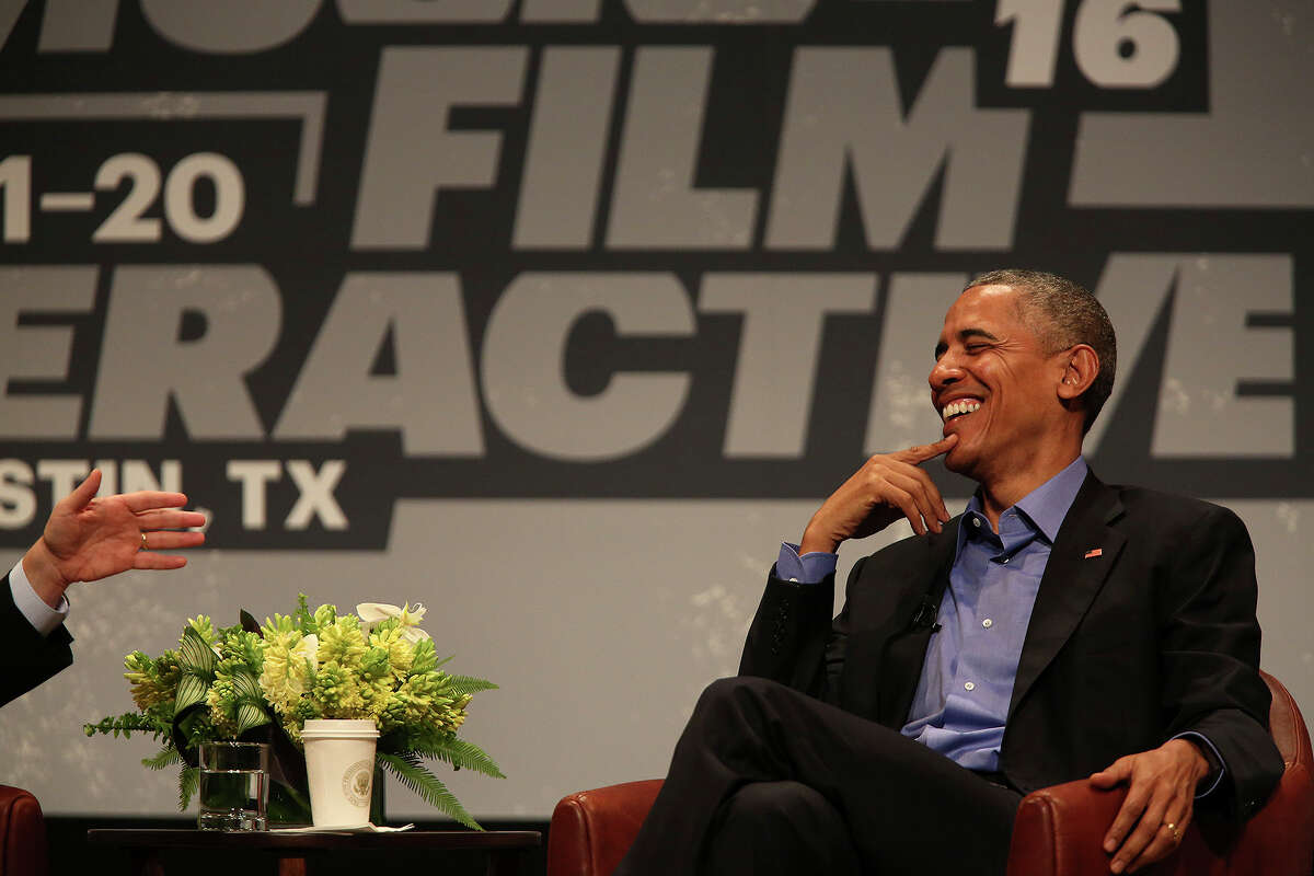 President Barack Obama laughs during his Keynote Conversation with The Texas Tribune CEO and Editor-in-Chief Evan Smith during South by Southwest Interactive at the Long Center for the Performing Arts in Austin on Friday, March 11, 2016.