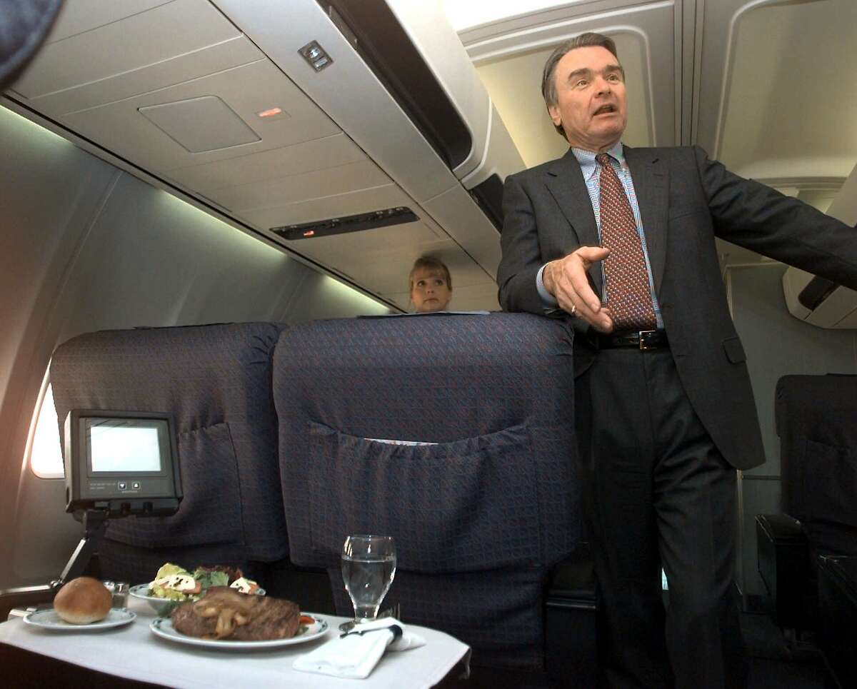 Gordon Bethune gives a tour of a Continental Boeing 757 in 1999. He was CEO of the airline at the time.