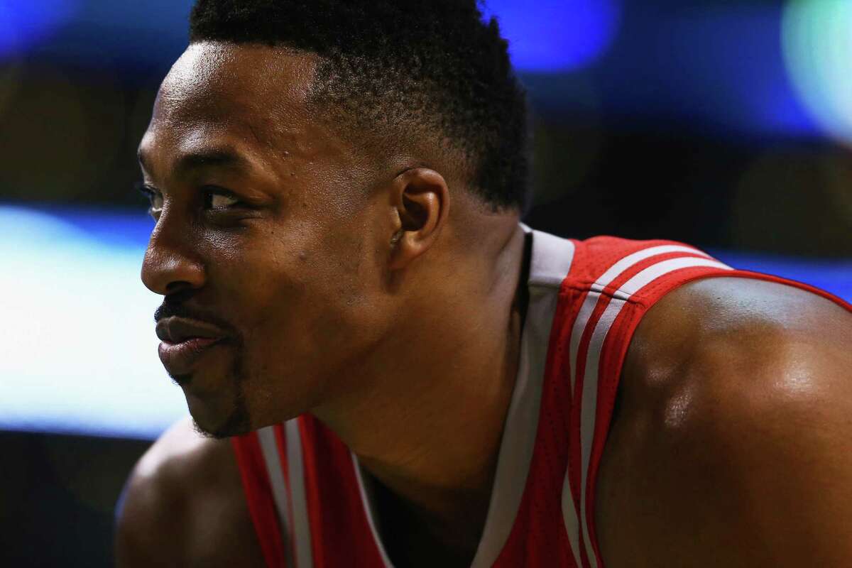 BOSTON, MA - MARCH 11: Dwight Howard #12 of the Houston Rockets looks on during the second quarter against the Boston Celtics at TD Garden on March 11, 2016 in Boston, Massachusetts. NOTE TO USER: User expressly acknowledges and agrees that, by downloading and/or using this photograph, user is consenting to the terms and conditions of the Getty Images License Agreement.