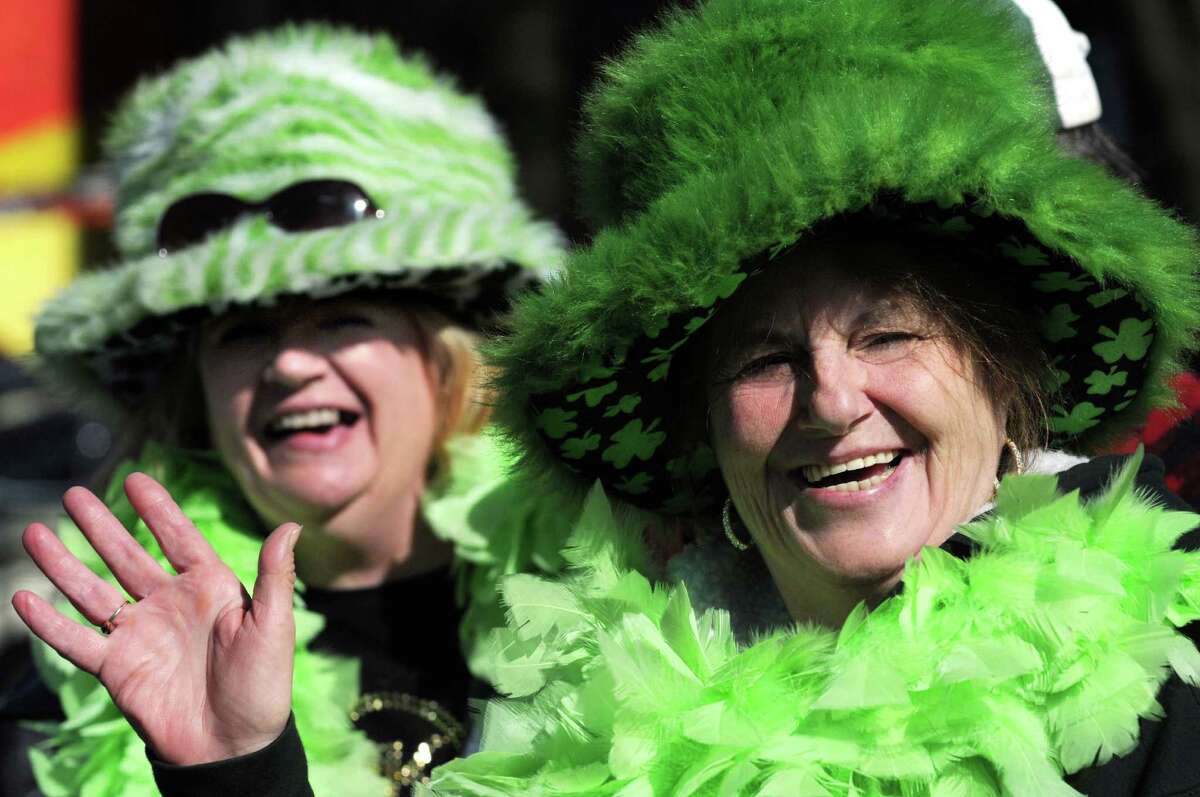 Friends Sandy Lovely of Lake Desolation, left, and Myrtle Gauthier of Colonie don their festive wear for the St. Patrick's Parade on Saturday, March 12, 2016, in Albany, N.Y. (Cindy Schultz / Times Union)
