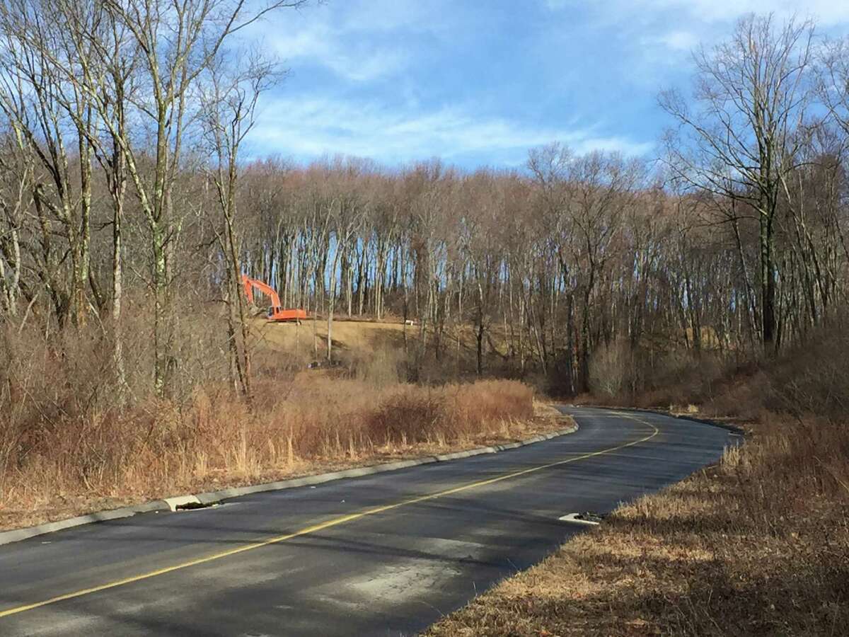 Construction equipment prepares the site of a new power plant on Woodruff Hill Road in Oxford. The facility, to be built by Maryland-based Competitive Power Ventures, closed on its financing on March 11, 2016.