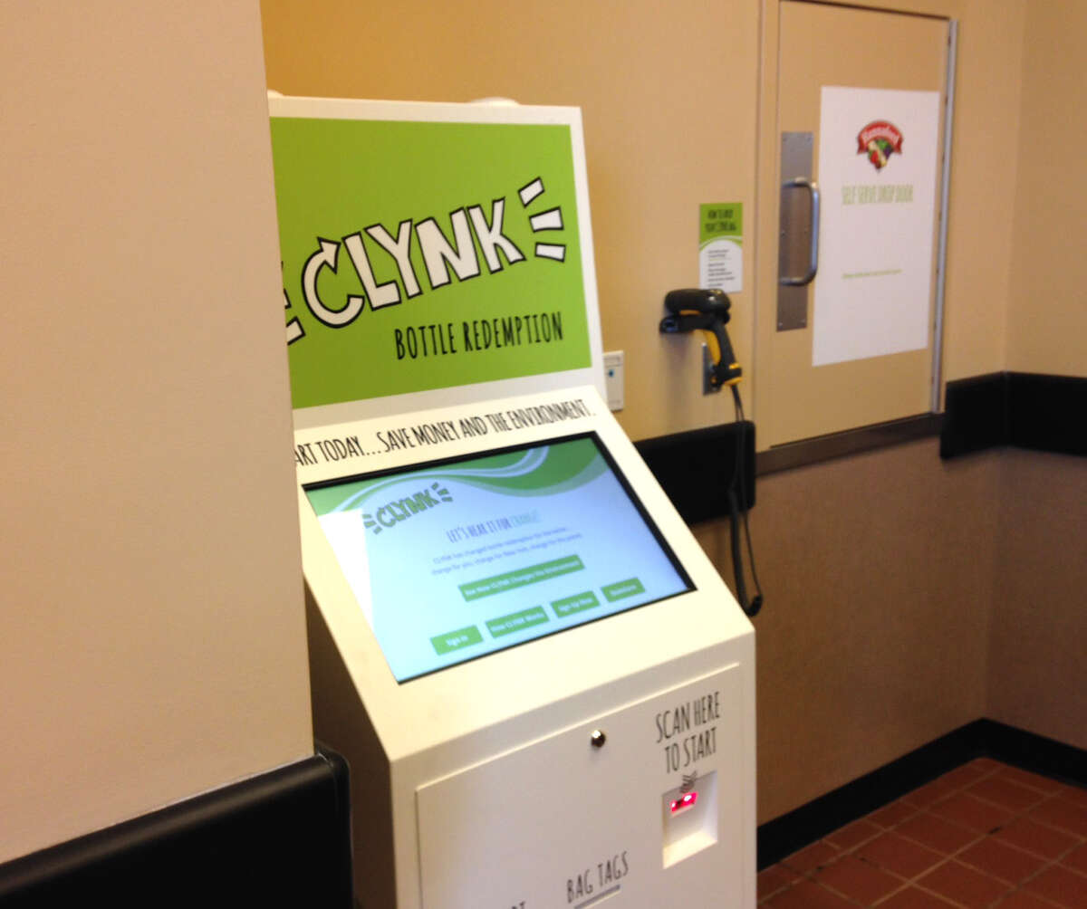 A CLYNK recycling kiosk at Hanford supermarket is shown during a launch of their new recycling program on Monday, March 14, 2016, in Colonie, N.Y. Hannaford customers can go to a store with a bag of recyclables, scanning a tag that identifies their personal account or a charity they designate, and then dropping the bag through a door into a room where Hannaford employees scan them. The first 10 bags are free. After that, it's $1.75. Charities receive 100 bags. The program was launched Monday at the Latham store but will expand to others. (Tim O?’Brien/Times Union)