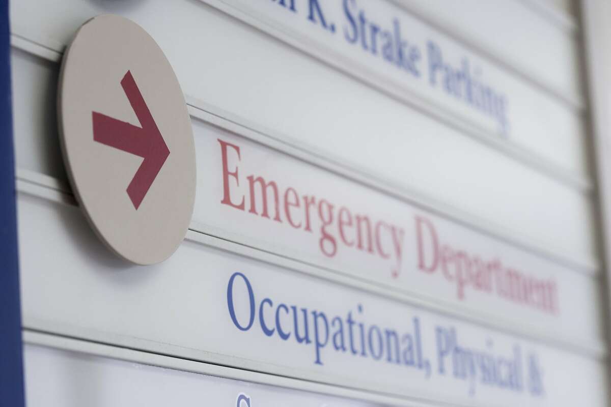 File photo of generic hospital emergency room. Close up of sign for emergency department in hospital