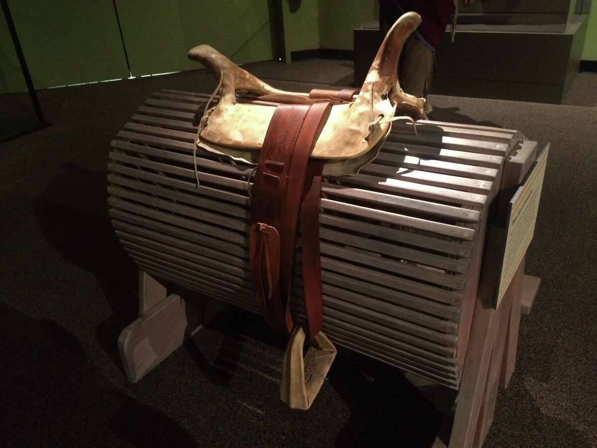 The exhibit has a lot of interactive elements, including a Comanche saddle that visitors can climb on to get a feel for what it’s like to be on horseback.