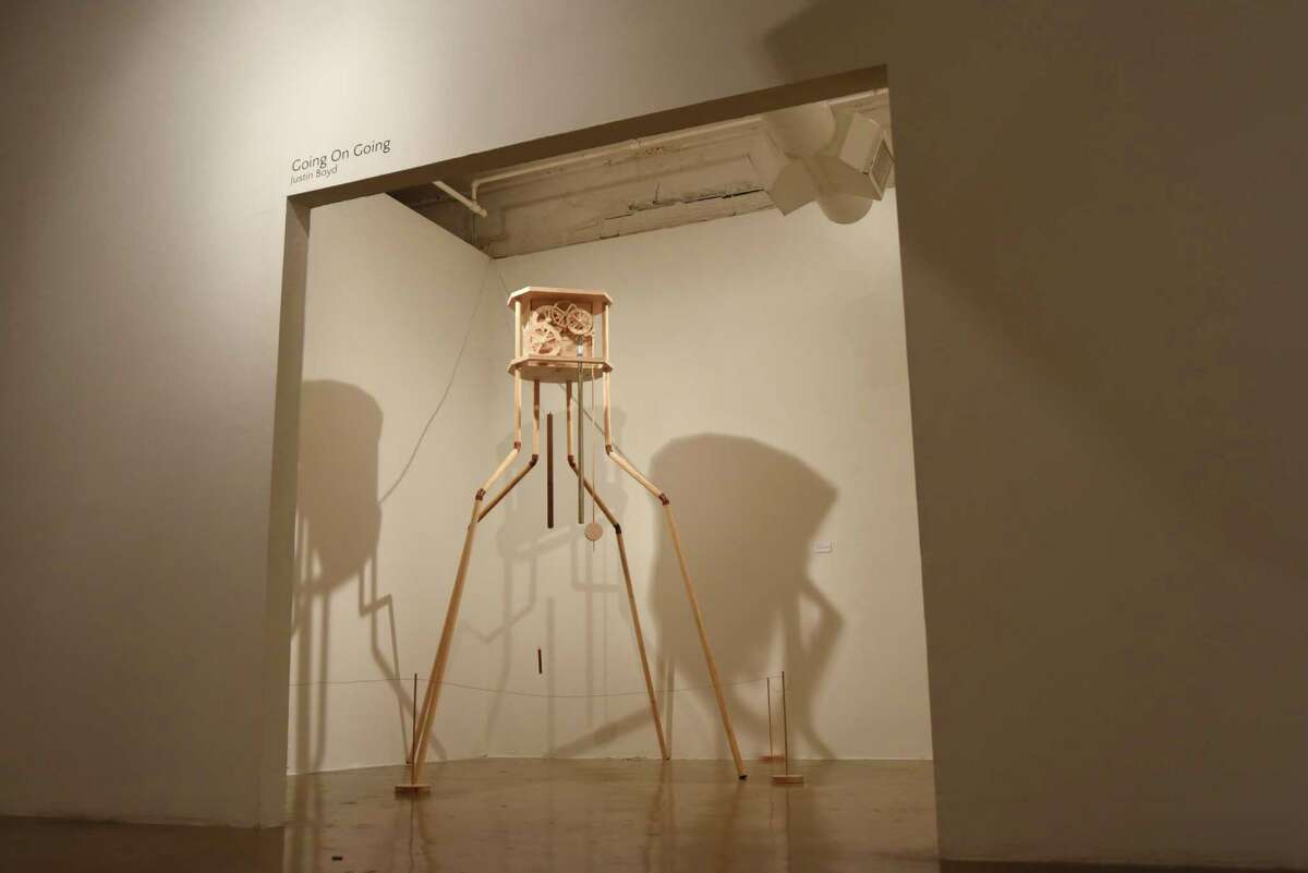"Going on Going" by Justin Boyd is a mechanical clock of wood, copper and other materials.