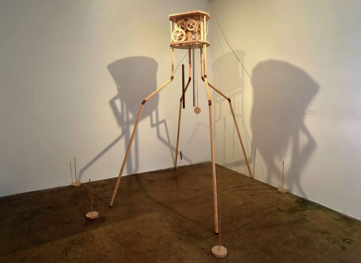 "Going on Going" by Justin Boyd is a mechanical clock of wood, copper and other materials. It is on display as part of Contemporary Art Month at the Blue Star Contemporary Art Museum. March 9, 2016.
