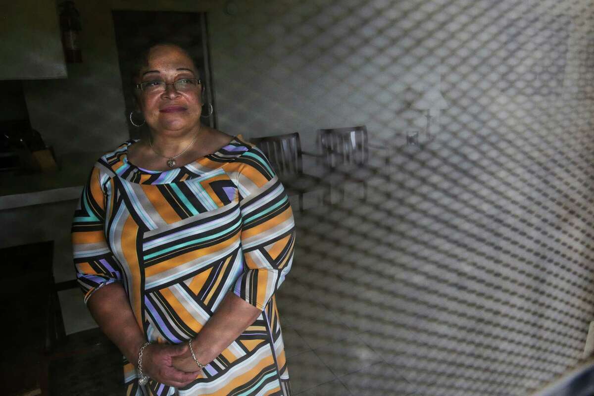 Precious Simon, who has been in Harris County's jail diversion program, stands in her new apartment in Houston on Tuesday﻿. ﻿