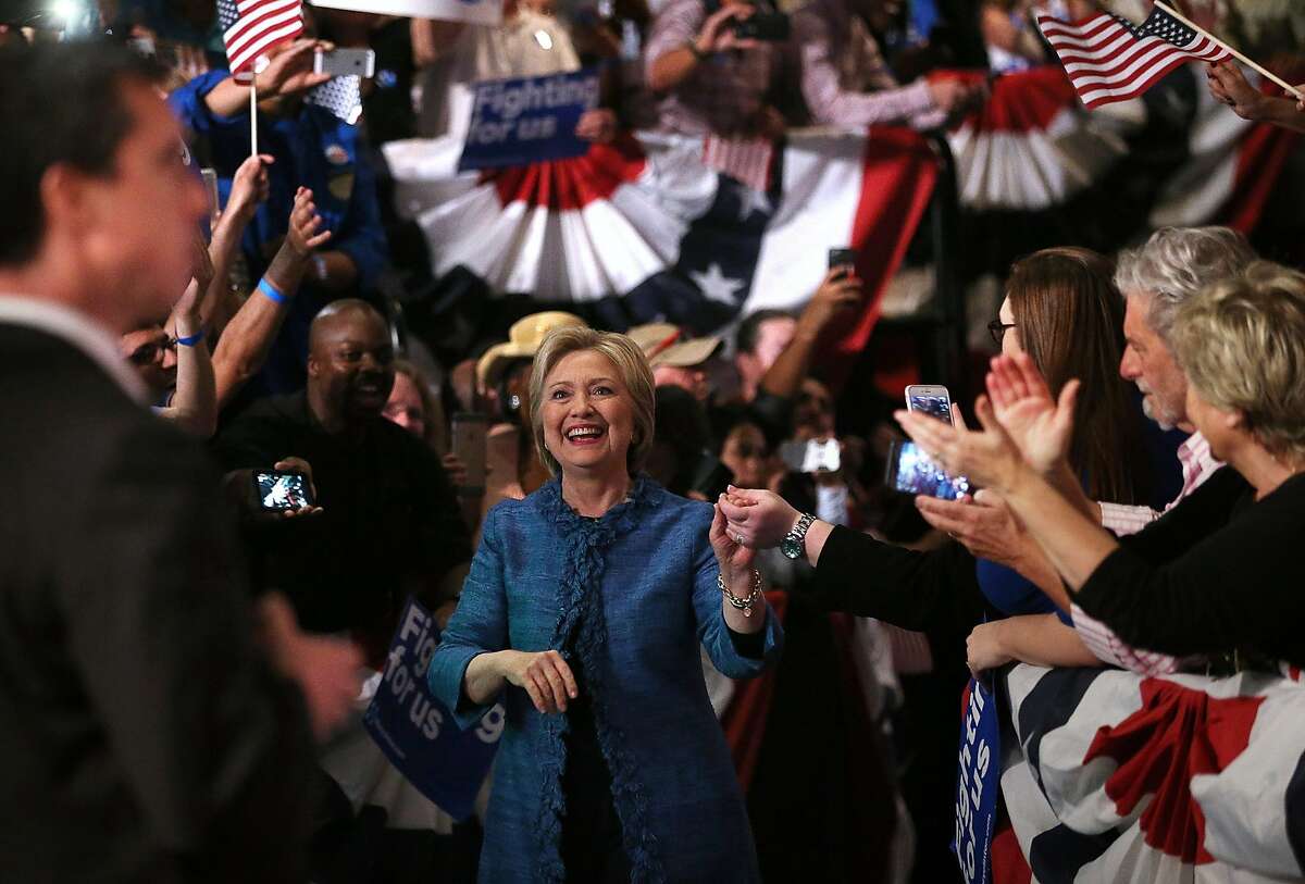 WEST PALM BEACH, FL - MARCH 15: Democratic presidential candidate former Secretary of State Hillary Clinton greets supporters during her primary night gathering on March 15, 2016 in West Palm Beach, Florida. Hillary Clinton defeated rival U.S. Sen Bernie Sanders in the Florida, Ohio and North Carolina primaries. (Photo by Justin Sullivan/Getty Images)