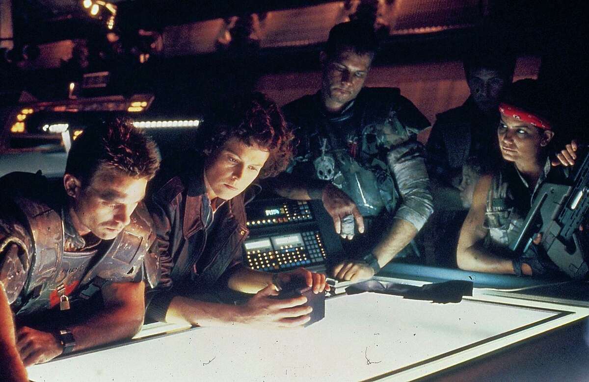 Actors Michael Biehn, Sigourney Weaver, Bill Paxton, Paul Reiser and Jenette Goldstein, in a scene from the movie 'Aliens', 1986.