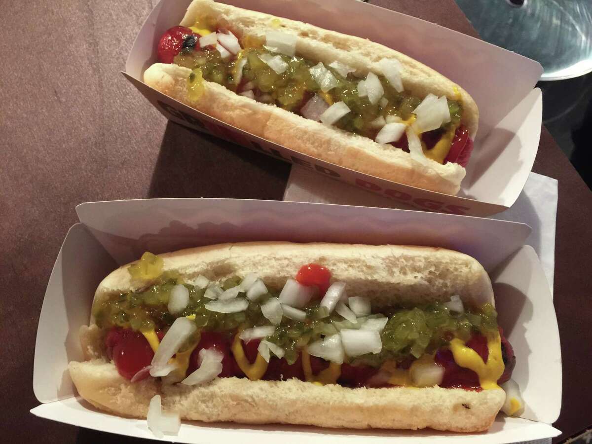 This Tuesday, Feb. 9, 2016, photo, shows a Burger King "classic" hot dog at a media event to introduce the restaurant's new menu item, in New York. Burger King plans to start selling the hot dogs in the U.S. on Feb. 23. The company says it will offer two options of grilled dogs, a Â?“chili cheeseÂ?” and Â?“classicÂ?” that has relish, onions, ketchup and mustard. (AP Photo/Candice Choi)