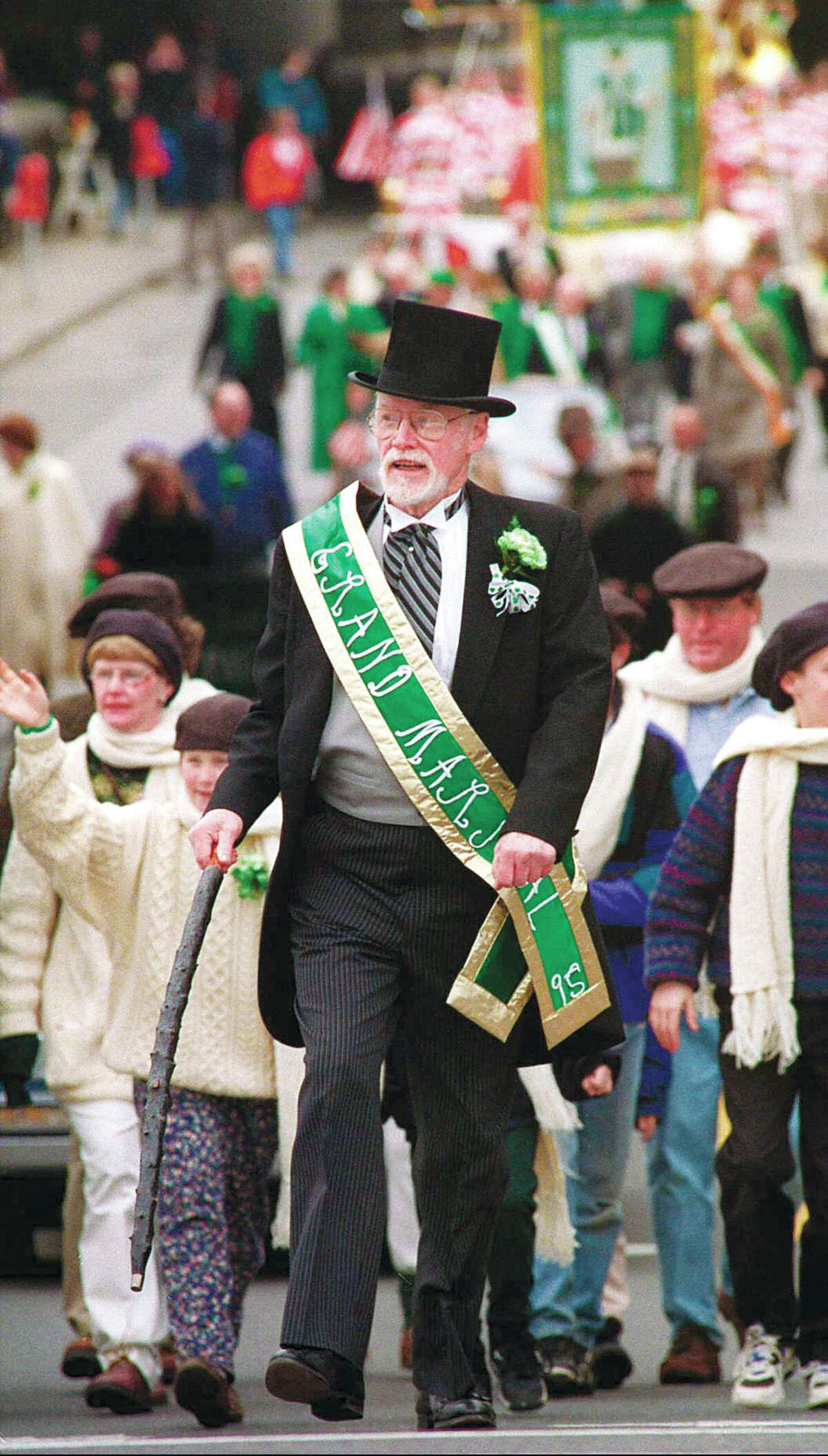 John Cullen Murphy, follows the police color guard while serving as grand marshal of the 1995 St Patrick’s Day Parade in Greenwich.